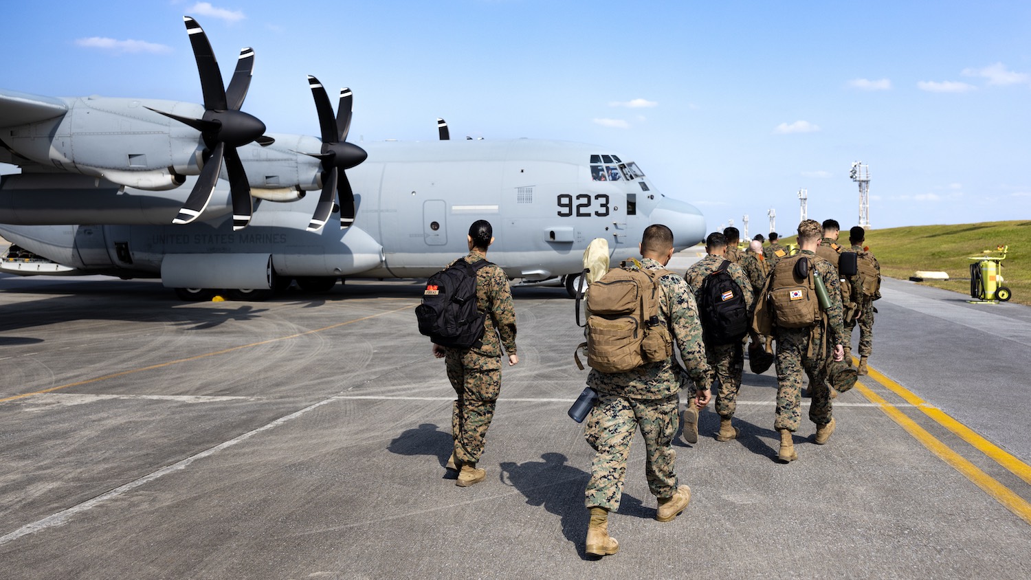 U.S. Marines with III Marine Expeditionary Force Support Battalion, III Marine Expeditionary Force Information Group, board a C-130J Super Hercules on Kadena Air Force Base, Okinawa, Japan, Jan. 20, 2023. III MSB sent a small quartering party to prepare the main body movement prior to Bushido Strike 23, a training event in South Korea where III MSB will conduct their Marine Corps Combat Readiness Evaluation to validate its mission essential tasks to provide combat service support, and administrative services to III Marine Expeditionary Force. (U.S. Marine Corps photo by Cpl. Cesar Ronaldo Alarcon)